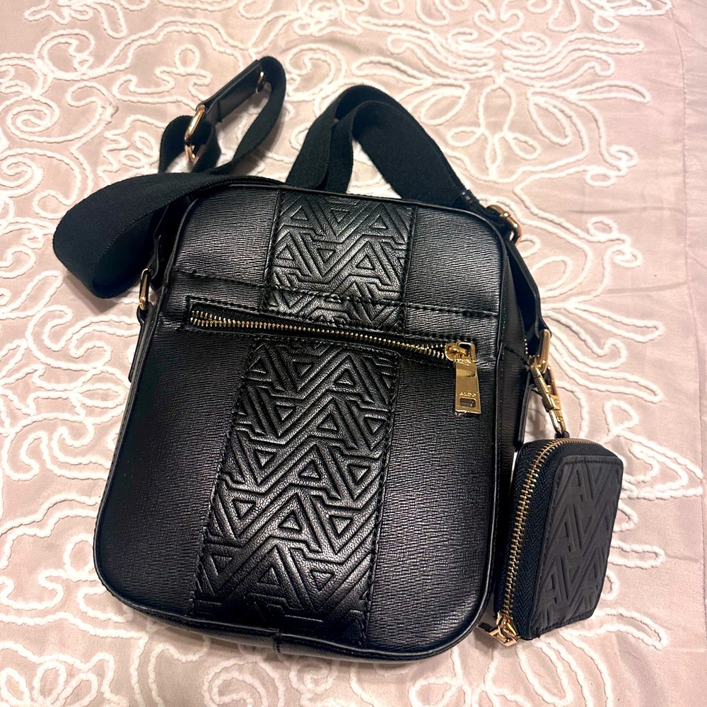 Next to new black and gold Aldo cross bag